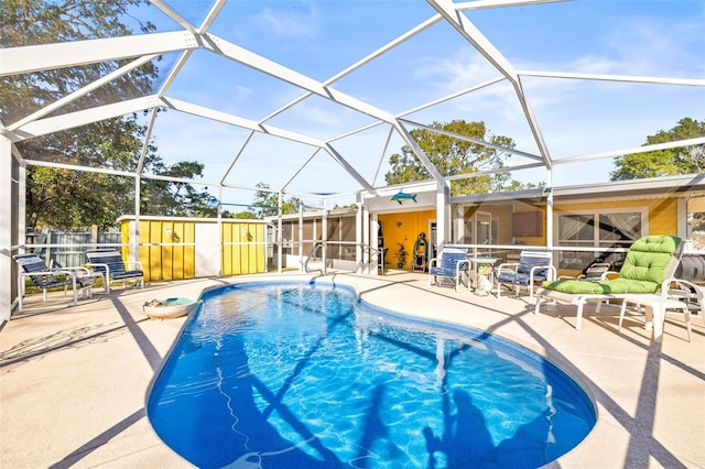 view of pool featuring a patio and a lanai