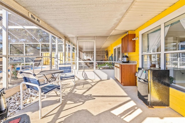 sunroom / solarium with plenty of natural light