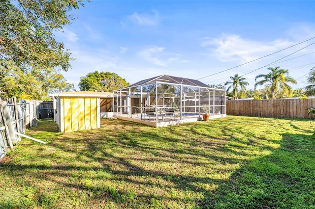 view of yard featuring a lanai and a patio