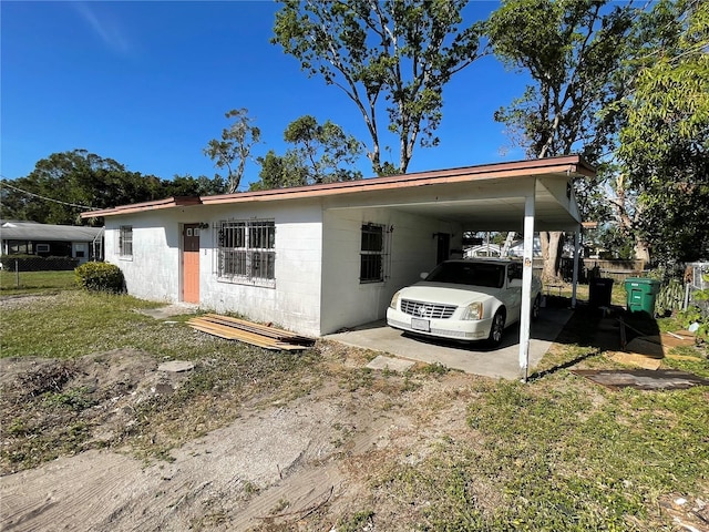 view of front of house with a carport