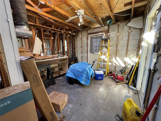 interior space with ceiling fan