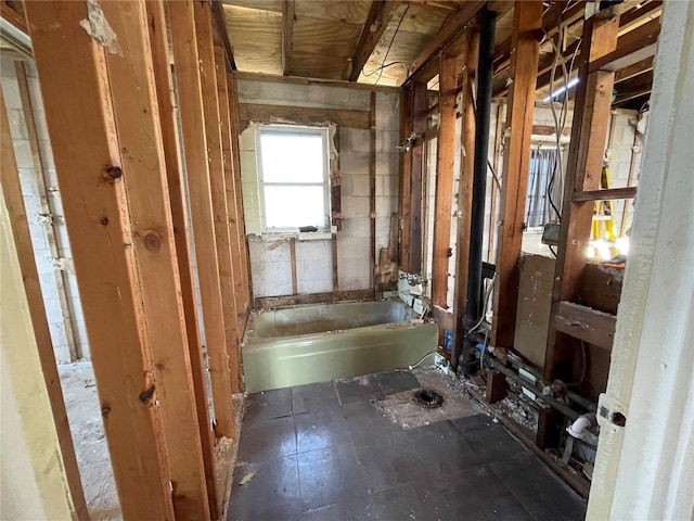 bathroom featuring a tub