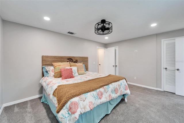 carpeted bedroom with a closet