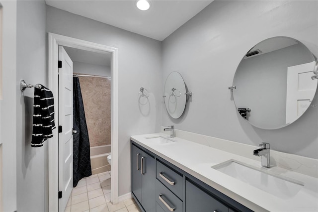 full bathroom with tile patterned floors, vanity, toilet, and shower / tub combo