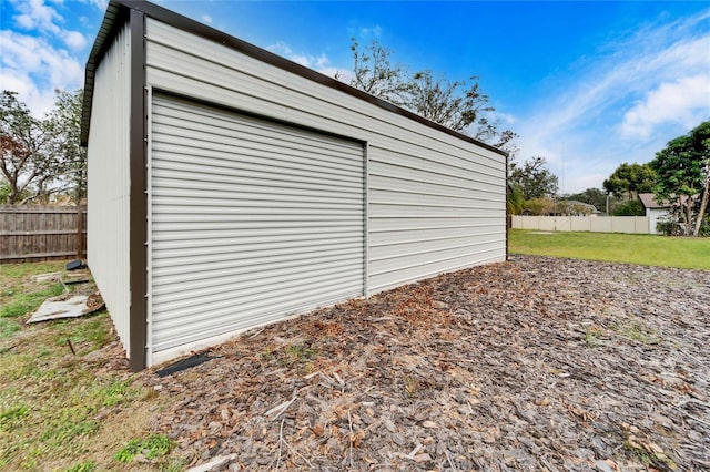 garage with a lawn