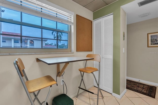 dining room featuring light tile patterned floors