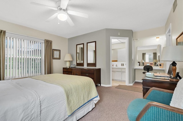 bedroom featuring light colored carpet and ceiling fan