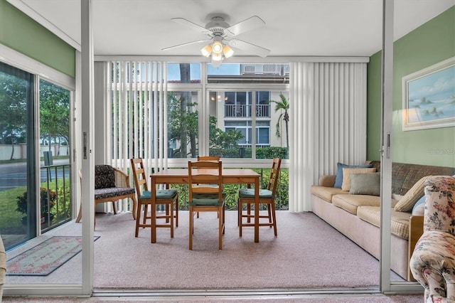 sunroom / solarium with ceiling fan