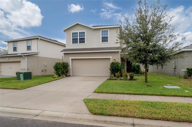 view of property featuring cooling unit, a front lawn, and a garage