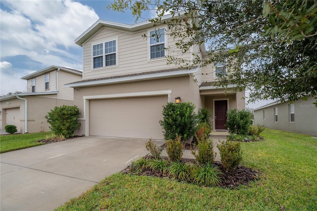 front facade with a garage and a front lawn