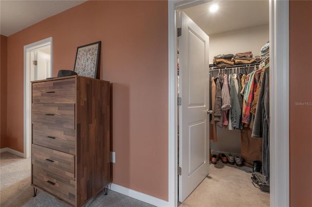 interior space featuring light colored carpet