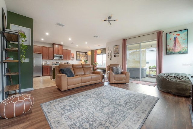 living room with light wood-type flooring