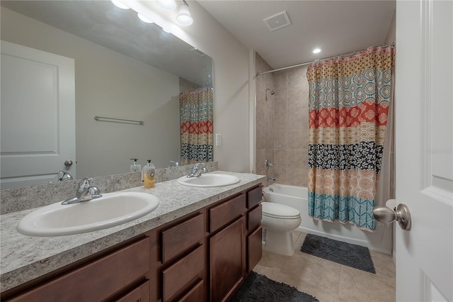 full bathroom with tile patterned flooring, vanity, shower / tub combo with curtain, and toilet