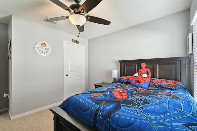 carpeted bedroom with ceiling fan