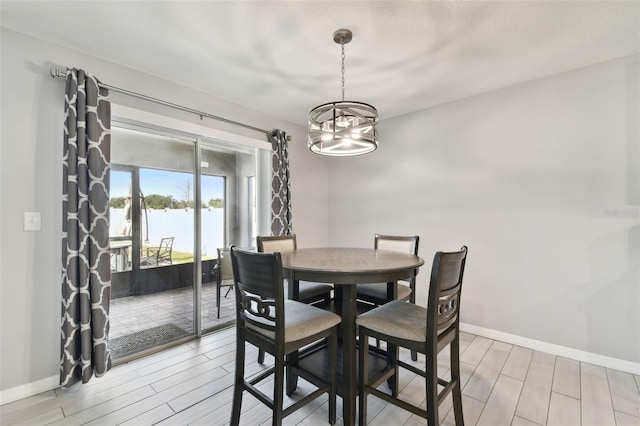 dining room featuring a notable chandelier