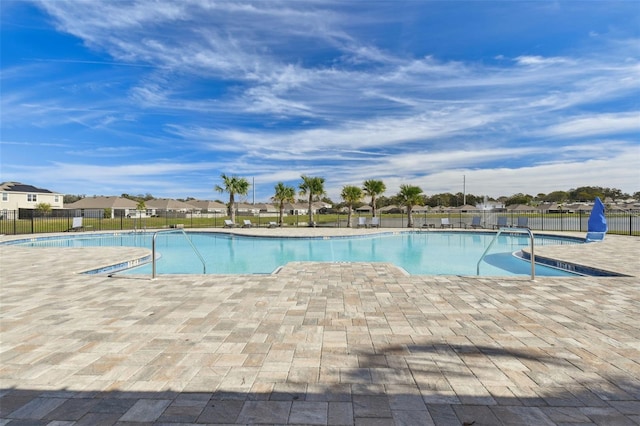 view of pool with a patio area