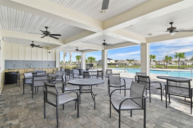 view of patio featuring a community pool