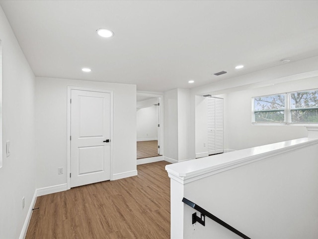 hall featuring light hardwood / wood-style floors