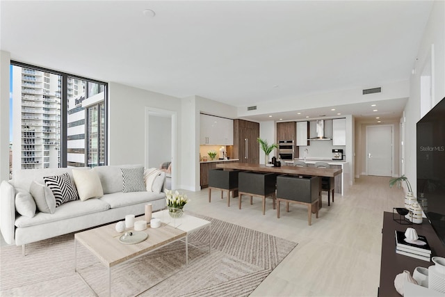 living room with floor to ceiling windows