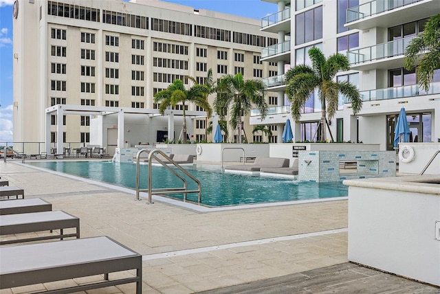 view of pool featuring a patio