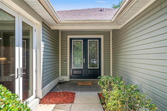 property entrance featuring french doors