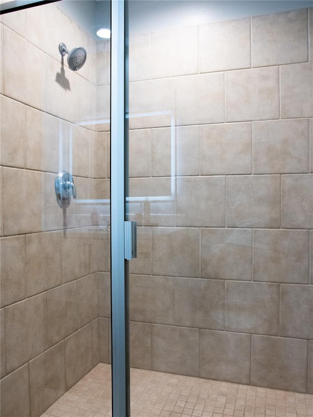 bathroom featuring a stall shower
