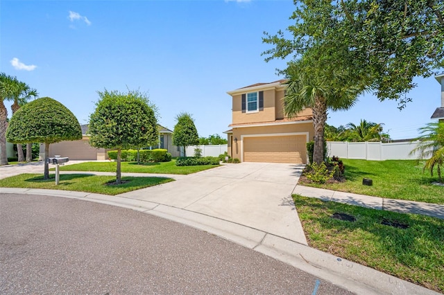 view of front of house featuring a front yard and a garage