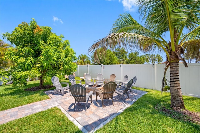 view of patio featuring a fire pit