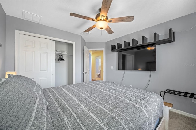 bedroom featuring ceiling fan, a closet, and carpet floors