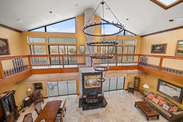 living room featuring an inviting chandelier, crown molding, high vaulted ceiling, and a wood stove