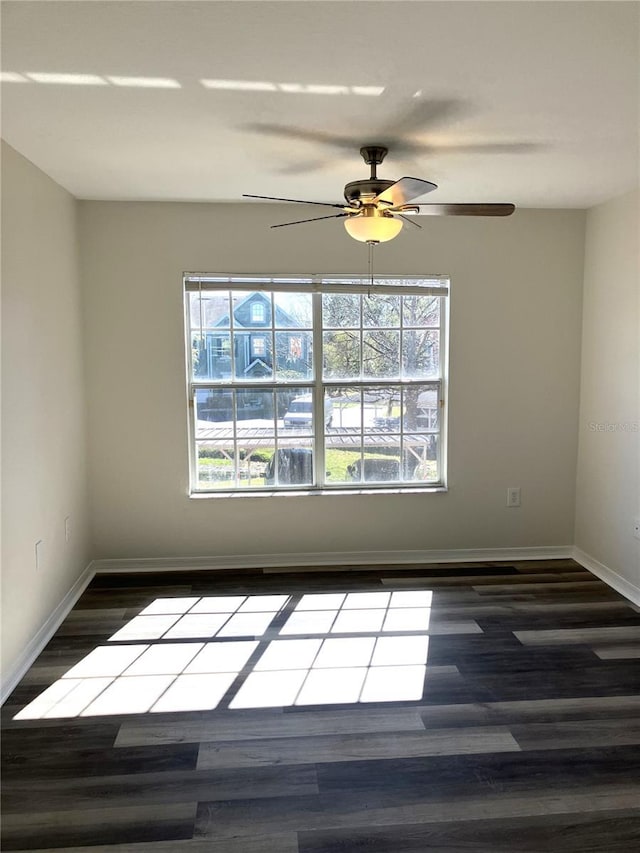 unfurnished room with wood-type flooring and ceiling fan