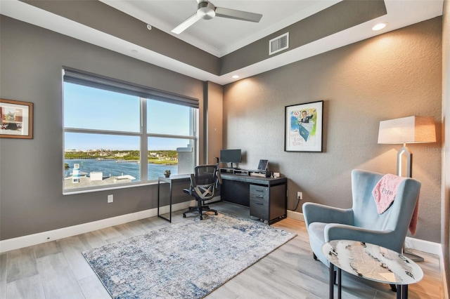 office with crown molding, ceiling fan, and light hardwood / wood-style flooring