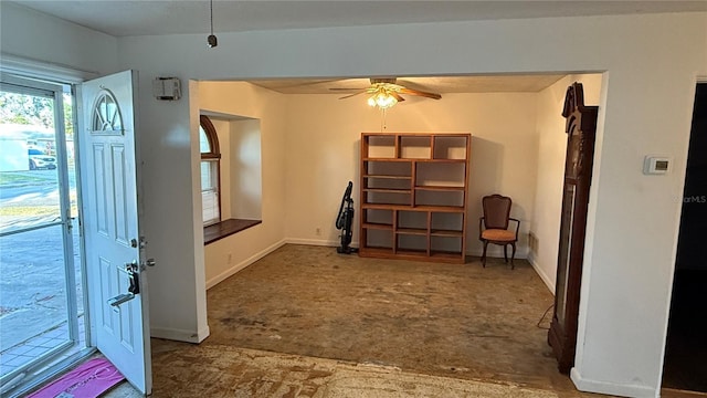 entryway featuring ceiling fan