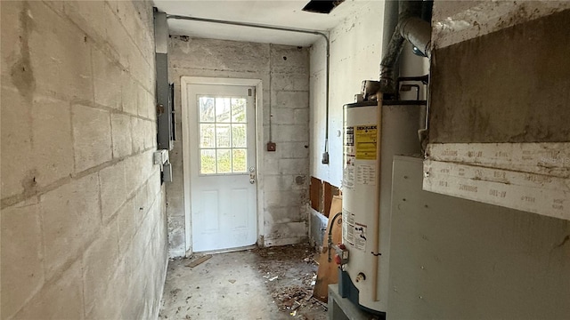 utility room featuring gas water heater