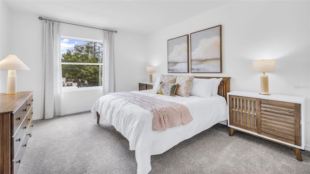 bedroom with light carpet