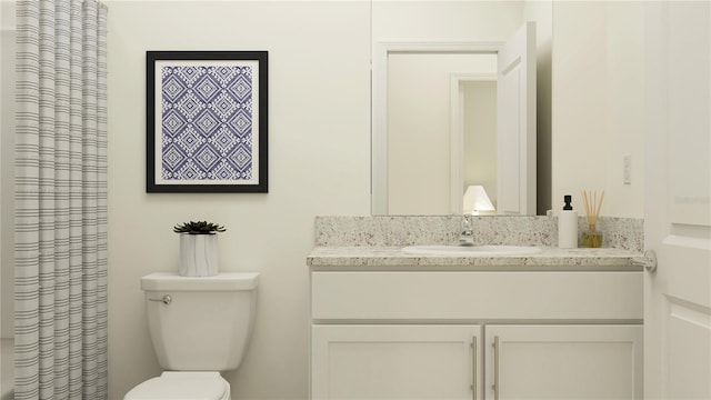 bathroom with vanity, curtained shower, and toilet