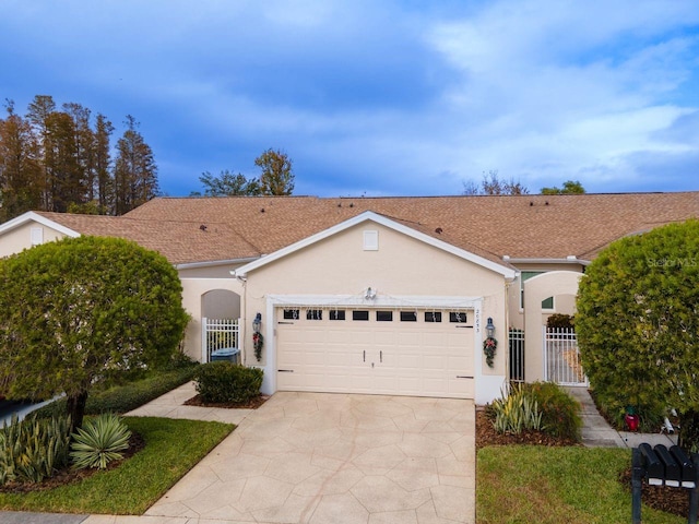 single story home featuring a garage