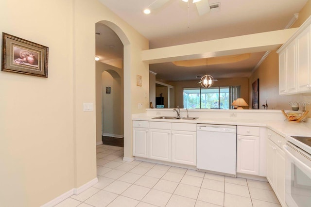 kitchen with sink, light tile patterned floors, decorative light fixtures, white appliances, and white cabinets