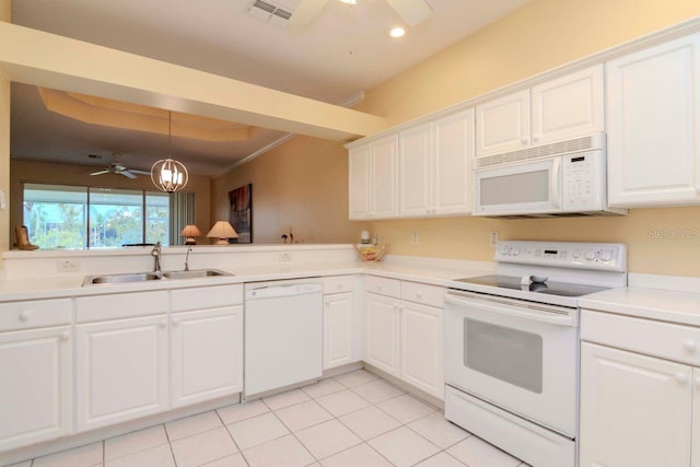 kitchen featuring white cabinets, light tile patterned floors, white appliances, and sink