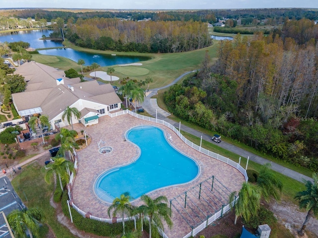 view of pool featuring a water view