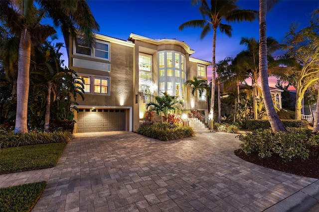 view of front of home with a garage