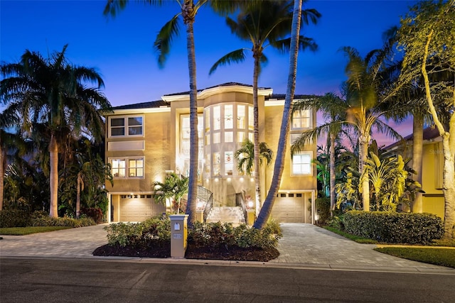 view of front of property with a garage