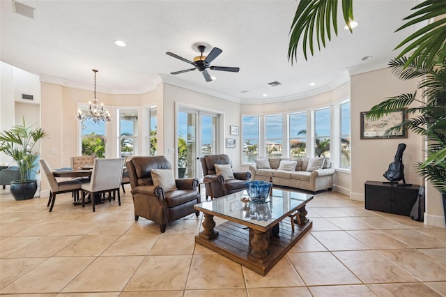 tiled living room featuring ceiling fan with notable chandelier and ornamental molding