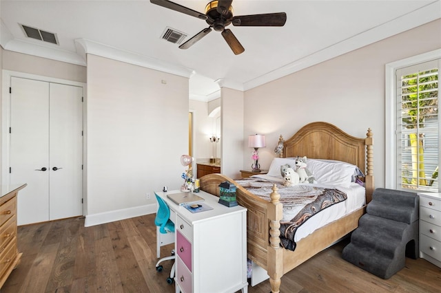 bedroom with ceiling fan, crown molding, and dark hardwood / wood-style flooring