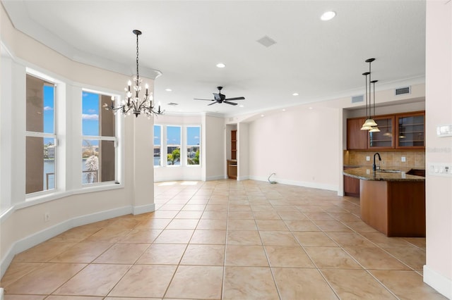 6015 Kipps Colony Dr E, Gulfport, FL 33707 - unfurnished dining area with light tile patterned floors, recessed lighting, a ceiling fan, and a chandelier