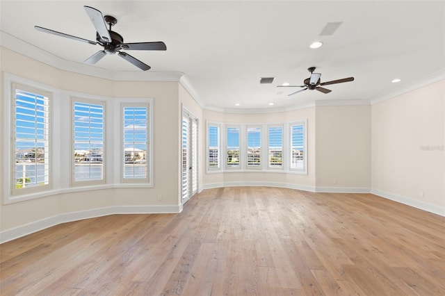 6015 Kipps Colony Dr E, Gulfport, FL 33707 - unfurnished living room featuring ceiling fan, light wood finished floors, ornamental molding, and recessed lighting