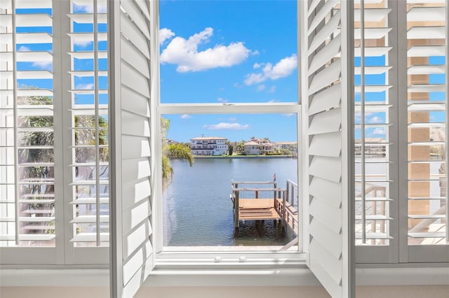 6015 Kipps Colony Dr E, Gulfport, FL 33707 - doorway with a water view