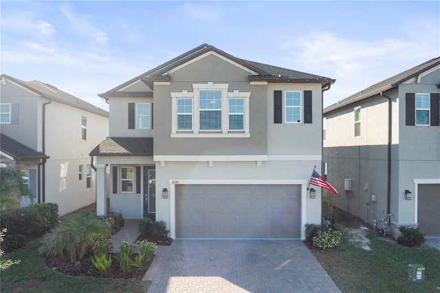 view of front of property with a garage