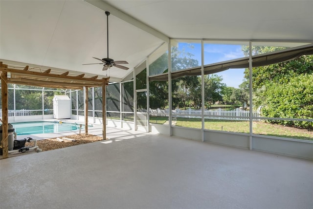 unfurnished sunroom featuring lofted ceiling with beams and ceiling fan