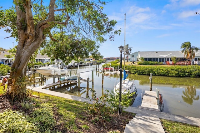 dock area with a water view